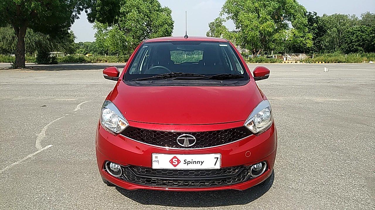 Spinny Assured 2016 Tata Tiago Frontal rojo